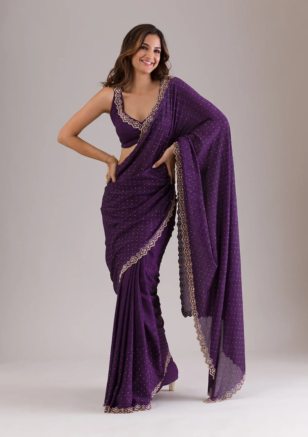 Purple Stonework Semi Crepe Saree